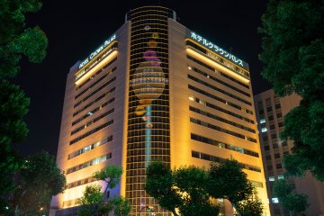 <p>Hotel illuminated at night</p>