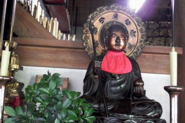<p>Bronze statue of Buddha looks peaceful</p>