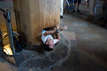 <p>The wooden pillar with hole in that you can get through if you wish to!</p>