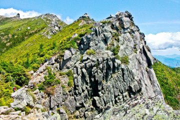 <p>One of several rocky peaks along the way to the summit of Mount Kinpu</p>