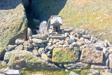 <p>A mini-shrine at the base of Mount Kinpu</p>