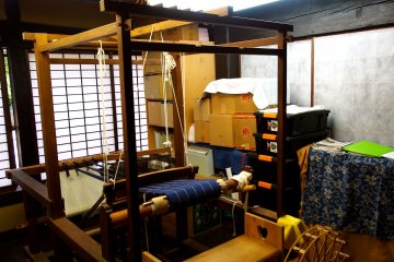 <p>The traditional looms are enormous, manually operated mechanisms</p>