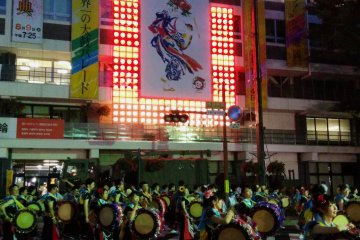 <p>The tradition continues. A poster in the background looks over this year's performers</p>