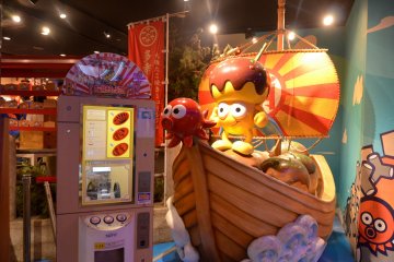 <p>Bring home a souvenir coin bearing the Takoyaki&nbsp;Museum logo.</p>