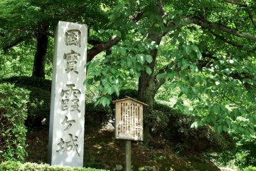 <p>The stone signage says, 'National Treasure, Kasumiga-jo (alias of Maruoka Castle). This castle was designated as a national treasure in 1934, then in 1950 it was designated an important cultural property of Japan</p>