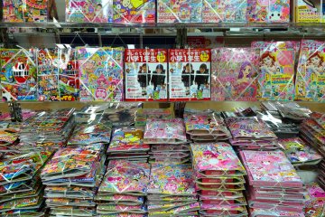 <p>Visit a Japanese bookstore! Some anime, manga, &amp; fashion magazines will come packaged with a free gift.</p>
