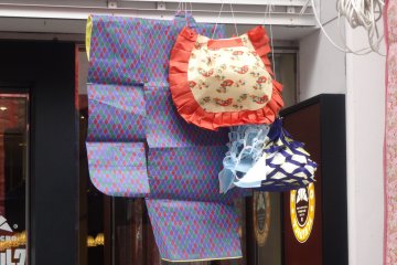 <p>Paper kimono wards off bad luck</p>