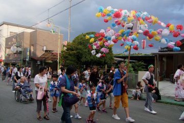 <p>Parade groups making their way through</p>