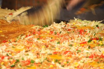 <p>Streets are lined with 'yatai' serving food and local snacks</p>