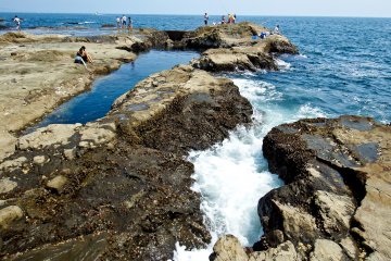 <p>The waves usually come crashing against the rocky shores</p>