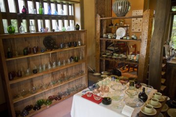 <p>Interior of Akizuki, a beautiful shop near the visitor parking area specializing in fine pottery and glassware from Kyushu and all over Japan</p>
