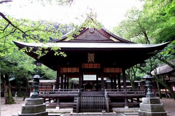 <p>This building probably is a Noh stage, or some platform where Shinto rituals are performed</p>