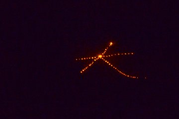 The Kanji character symbolising "Large" being set ablaze on the Daimonji mountain.