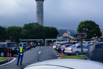Parking lot attendants will help you find a spot