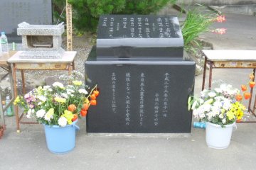 <p>The names of the students are grouped by grade. Their families invite visitors to touch the stone "to cool them down on a hot day, to warm them on a cold one, to show that we're thinking of them".</p>