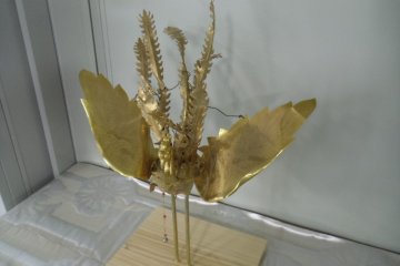 <p>This is an ornamental bird from the larger shrine, a symbol of survival</p>