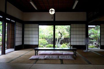 <p>Tables and cushion seating for visitors</p>