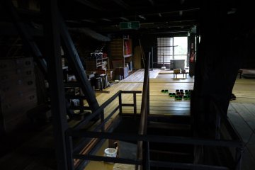 <p>The second floor acted as storage for silk production equipment, old furniture, trays of dishes, and many other interesting things</p>