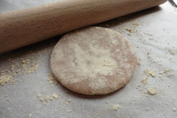 <p>The dough covered in kinako powder (soybean flour)&nbsp;</p>