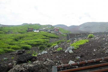 <p>Looking up at the various huts on Mount Fuji</p>