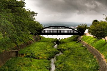 <p>A bridge where the water snakes inland</p>