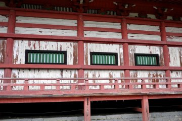 <p>The paint on the temple was worn and flaking</p>