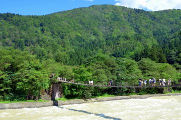 <p>To get to the village, one will have to cross the long bridge over the river.&nbsp;</p>
