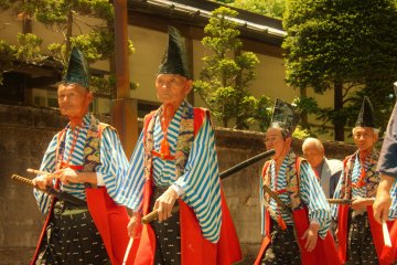 <p>Another example of traditional dress, fifty different styles are displayed in the procession</p>