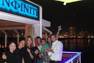 <p>Staff with friends on the back corner part of the patio</p>