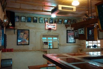 <p>Back seating and bar area</p>