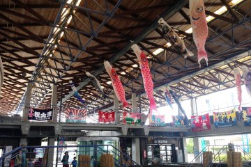 <p>A spacious hall in the middle gives the place a feeling of light and space, which was decorated with koinobori carp banners as well as tairyobata or fisherman&rsquo;s flags hanging from the ceiling as it was just after Children&rsquo;s Day in May.</p>