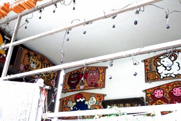 <p>There were giant Ema plaques displayed inside the side building</p>