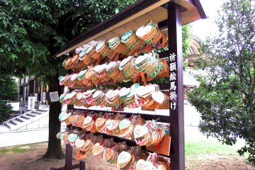 <p>Ema plaques in the corner of the shrine</p>