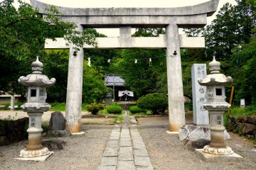 <p>Straight path under the stone torii</p>