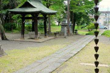<p>The chain is Japan's attractive version of a downspout - rain water simply tricks down the chain!</p>