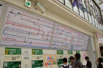 <p>Checking the map of the vast JR East train system</p>