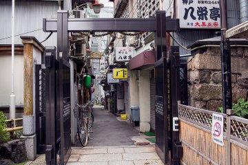 <p>The surrounds of the shrine seems to reveal Osaka's underbelly</p>