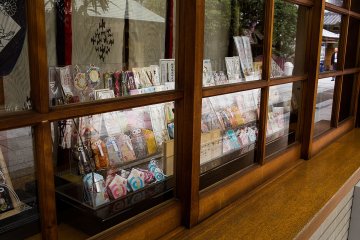 <p>Various charms are available for purchase from the shrine office</p>