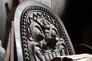 <p>An "Onigawara", a ridge-end roofing tile with the design of a devil's face, placed in the Great Buddha Hall</p>