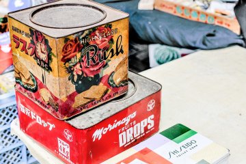 <p>Wouldn't be a flea market without a collection of vintage tin boxes</p>