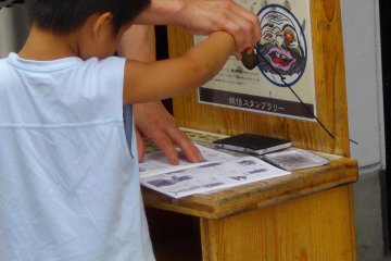 The stamp hunt along Mizuki Shigeru Road.