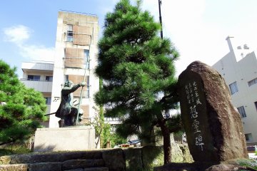 <p>Kitano-Sho Castle Ruins stands in the middle of multiple-tenant buildings near JR Fukui Station</p>