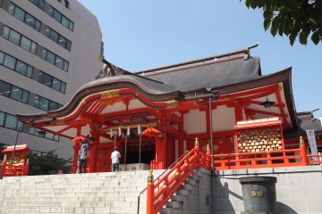 The main hall stands out from the office blocks around it
