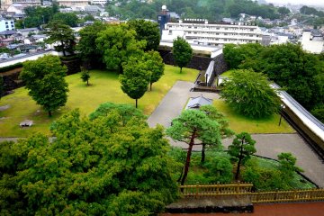 <p>Another side of the park, enclosed in long white walls</p>