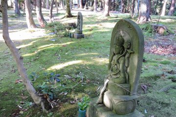 <p>Statue Number seven of Kannon Bosatsu has a lotus flower in her hand</p>