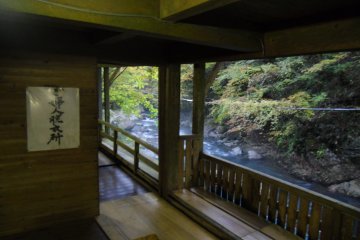 <p>The open air change area overlooking the river. No showers, but there is a place to leave your clothes before descending down to the river</p>