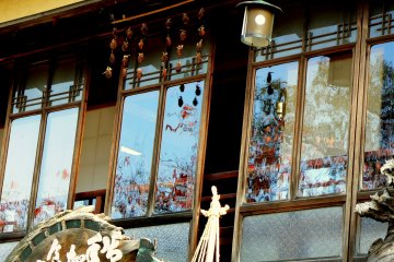 <p>Persimmons drying under the eaves</p>