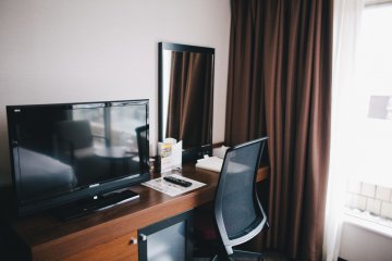 <p>Desk area and television</p>