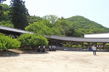 <p>The 400 meter covered corridor with some teens practicing their Kyudo</p>