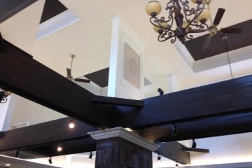 Chandelier and open beam ceiling